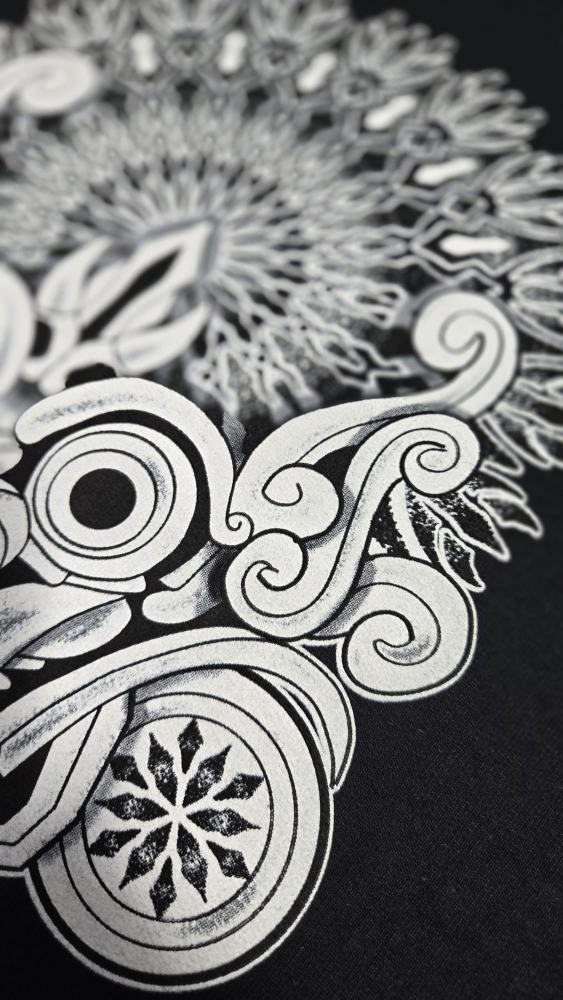 Close-up detail of the Balinese demon mask screen print, showing fine linework