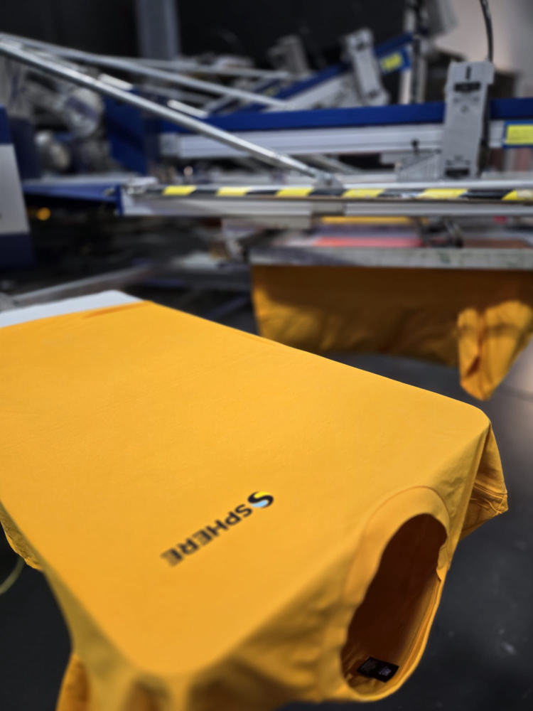 Ssphere branded yellow tee fresh off the press