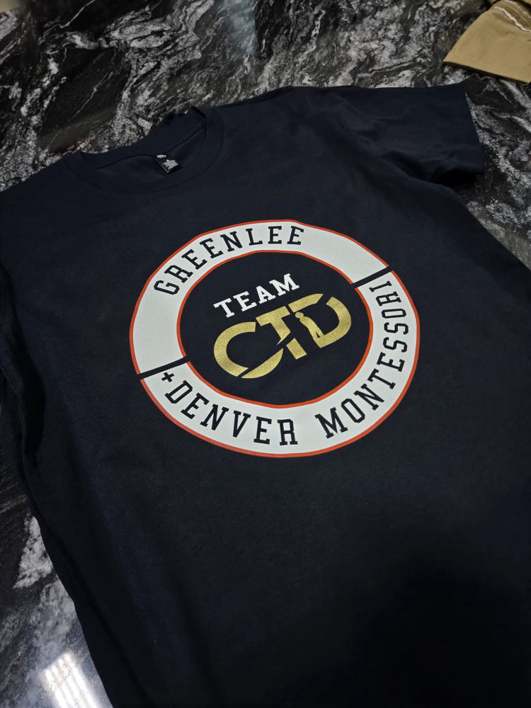 Team CTD Greenlee Denver Montessori tee with gold foil logo