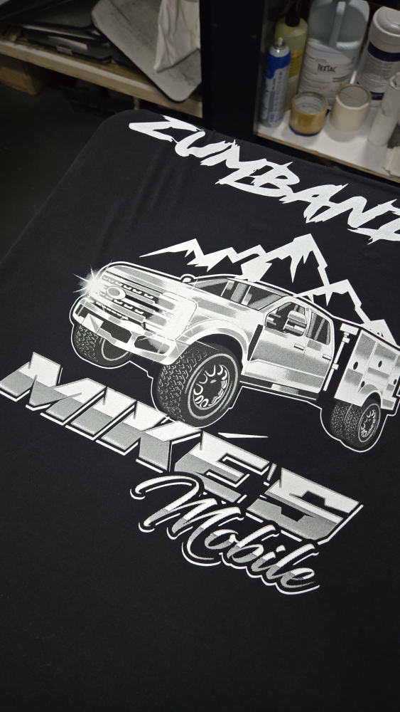Zumbandz x Mike's 55 Mobile tee featuring an illustrated lowered pickup truck